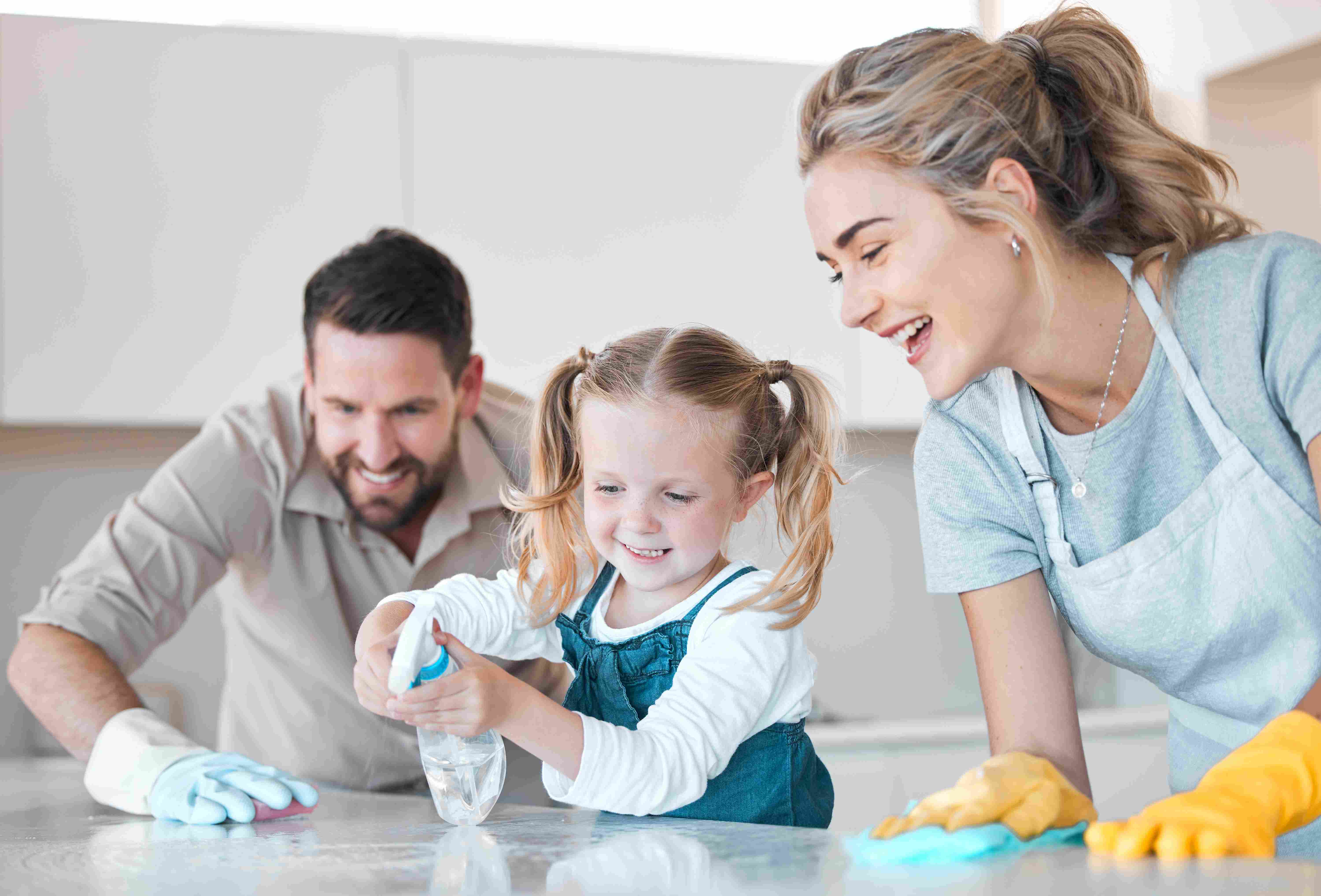family having fun cleaning together